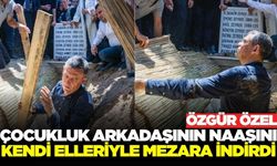 Özgür Özel arkadaşı Ferdi Zeyrek'in naaşını kendi elleriyle mezara indirdi