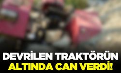 Devrilen traktörün altında kaldı!