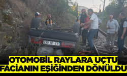 Balıkesir’de Korkutan Kaza: Otomobil Şarampolden Raylara Uçtu