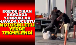 Yumruklar havada uçuştu, motosikletli yerde tekmelendi