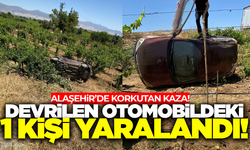 Alaşehir'de devrilen otomobildeki kişi yaralandı