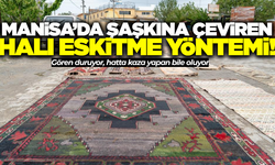 Manisa'da ilginç halı eskitme yöntemi!