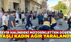 65 yaşındaki kadın, seyir halindeki motosikletten düşerek ağır yaralandı
