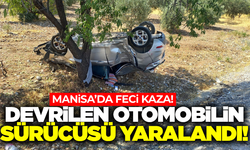 Manisa'da devrilen otomobilin sürücüsü yaralandı