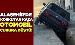 Alaşehir’de otomobil çukura düştü