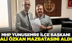 MHP Yunusemre İlçe Başkanı Ali Özkan Mazbatasını Aldı