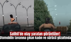 Salihli’de seyir halindeki otomobilin tavanına çıkan kadın ve sürücü gözaltına alındı