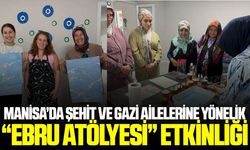 Manisa'da şehit ve gazi aileleri ebru sanatında buluştu
