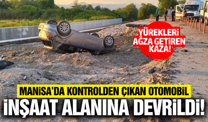 Manisa'da devrilen otomobilden mucizevi kurtuluş!