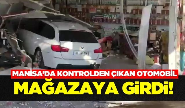 Manisa'da kontrolden çıkan otomobil mağazaya girdi